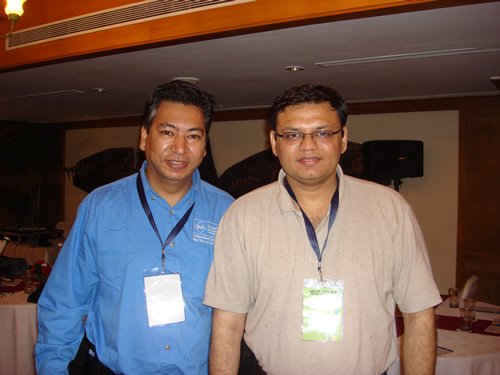 Two men at a professional event.